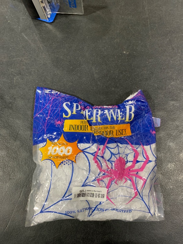 Photo 1 of 1000 sqft Spider Webs Halloween Decorations Bonus with 30 Fake Spiders, Super Stretch Cobwebs for Halloween Indoor and Outdoor Party Supplies