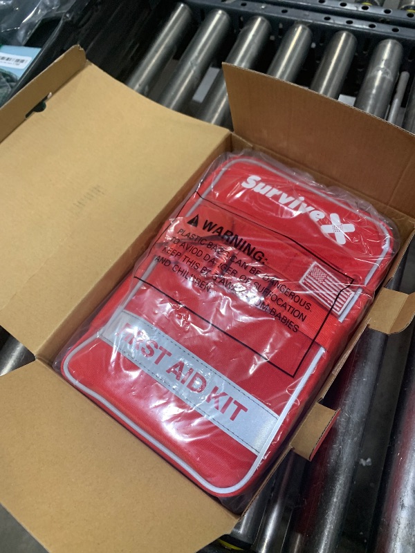 Photo 1 of  Large First Aid Kit for Car, Travel & Home - Emergency Kit for Hiking, Camping, Backpacking and Outdoors - Includes Zip Stitch Wound Closure Strips 