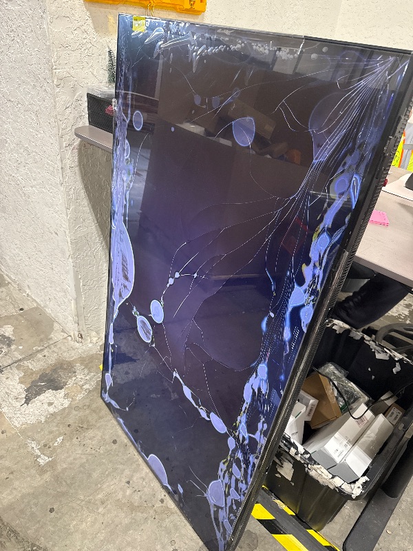 Photo 1 of Samsung 65inch -- parts only -- severely damaged, no remote
