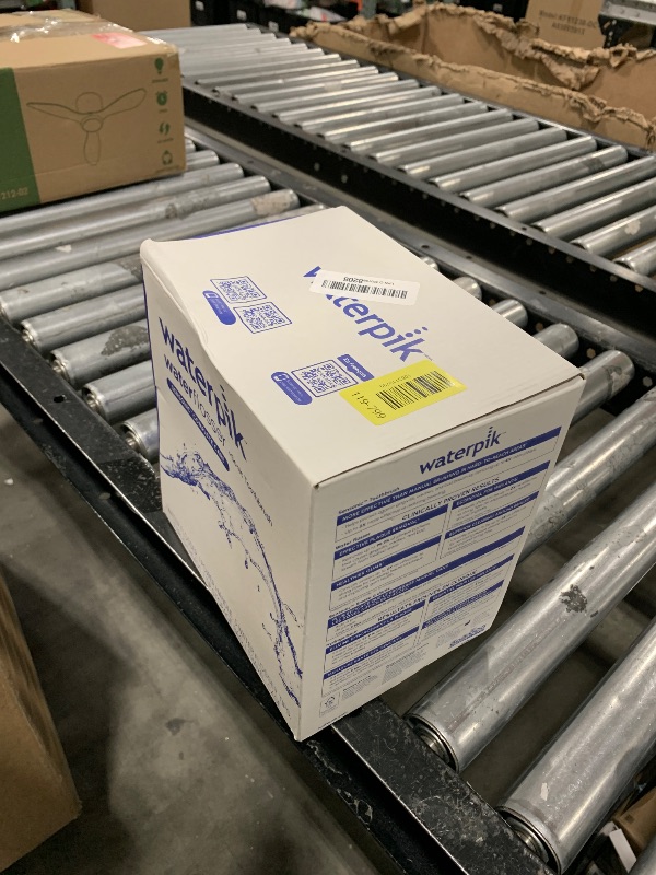 Photo 1 of Waterpik Sensonic Complete Care Water Flosser and Rechargeable Electric Toothbrush Combo Set for Teeth Cleaning and Flossing, CC-04, White, Packaging May Vary