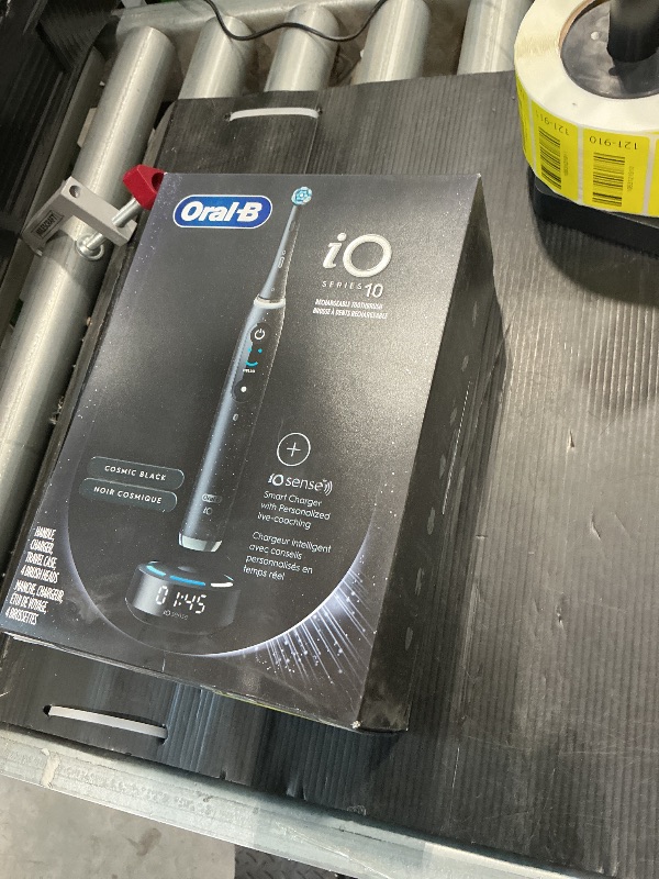Photo 1 of Oral-B iO Series 10 Rechargeable Electric Toothbrush with Visible Pressure Sensor to Protect Gums, 2 Min Timer, 7 Cleaning Settings, 4 Replacement Toothbrush Heads, and Charging Travel Case, Black