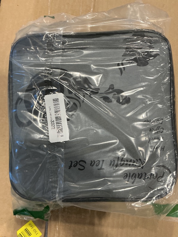 Photo 1 of *MINOR DAMAGE - USED*
Lyty Chinese Tea Pot Cup Set with Tray Infuser - Travel Ceramic Tea set Porcelain Teapot, Portable All in One Bag for Outdoor Picnic Business Hotel (White)