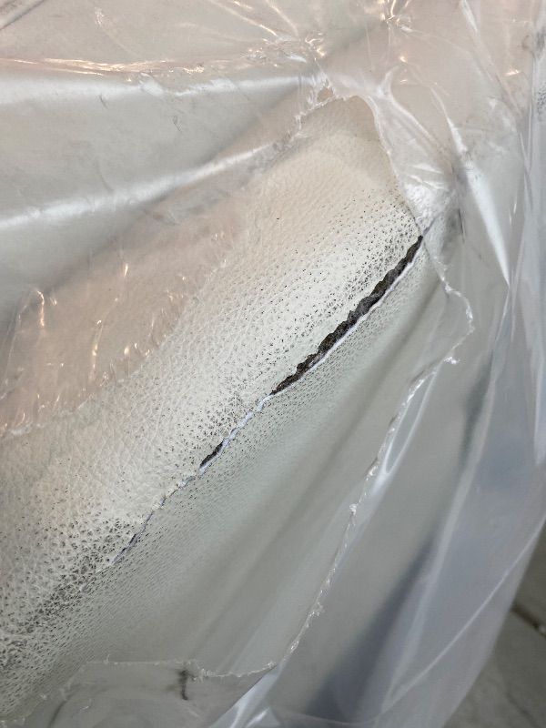 Photo 1 of *USED***MAJOR DAMAGE**
Signature Design by Ashley Mindanao Contemporary Power Reclining Sofa with Adjustable Headrest and Zero-Draw USB Charging, Leather, 21" Seat Height, Off White