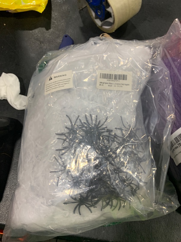 Photo 1 of 1000 sqft Spider Webs Halloween Decorations Bonus with 30 Fake Spiders, Super Stretch Cobwebs for Halloween Indoor and Outdoor Party Supplies