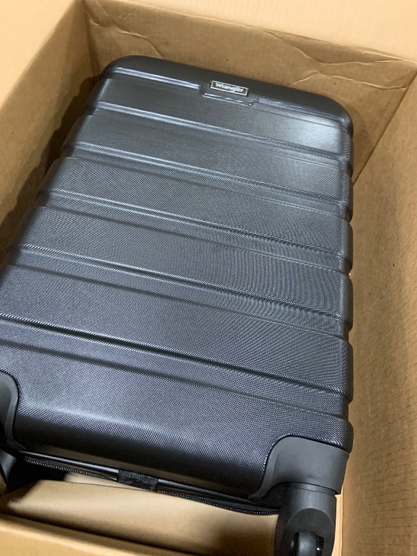 Photo 1 of Wrangler 20" Spinner Carry-On Luggage, Black