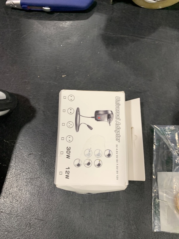 Photo 1 of 12W Universal Multi Voltage AC/DC Adapter Switching Power Supply with 6 Selectable Adapter Plugs, Suitable for 3 V to 12 V Device