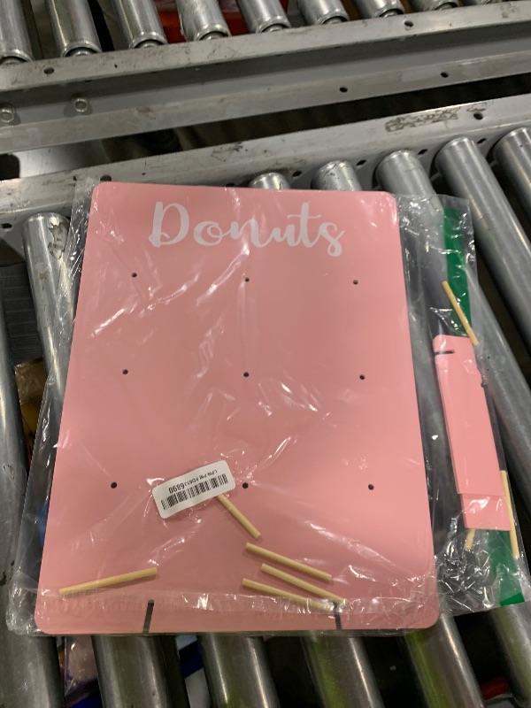 Photo 1 of ??Donut Stand for Party, Donut Wall Holders for Table, Reusable Wood Doughnut Pegboard for Baby Showers, Bridal Shower, Birthday, Wedding, Holds 9 Donuts