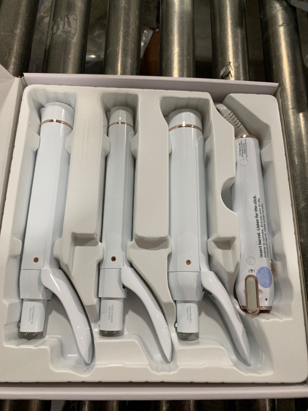 Photo 1 of T3 Switch Kit Classic Trio Professional Interchangeable Curling Iron with 3 Ceramic Clip Barrels for Curling and Waving, 9 Adjustable Heat Settings & Ion Generator