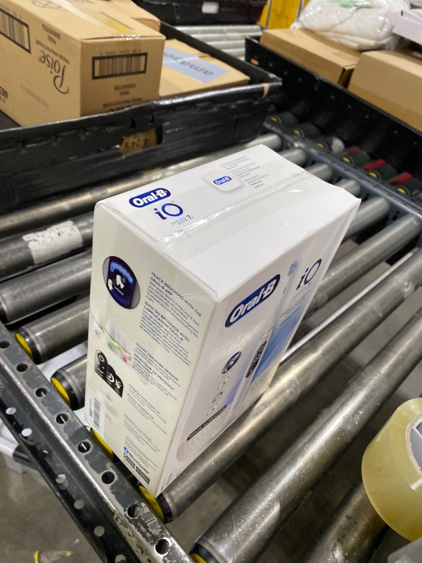 Photo 1 of Oral-B iO Deep Clean + Protect Rechargeable Electric Toothbrush, White, iO Series 7, 2 Replacement Brush Heads, Charging Travel Case