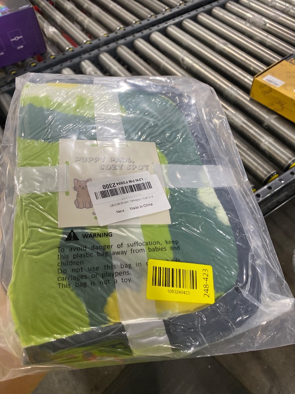 Photo 1 of Qeils Reusable Puppy Pads for Small Dogs, Washable Pee Pads with Non-Slip , Absorbent Leakproof Mat for Crates, Playpens, Pet Beds & Whelping, Indoor Potty Training Grass Green, 16"x12", 4 Pack