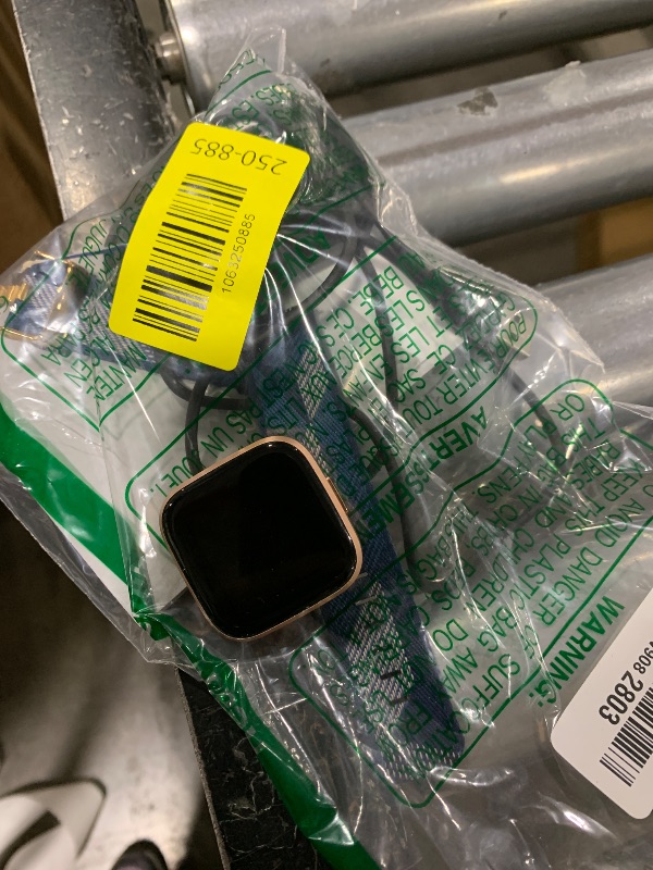 Photo 1 of Fitbit Versa 2 Special Edition Health and Fitness Smart Watch with Heart Rate, Music, Alexa Built-In, Sleep and Swim Tracking, Navy and Pink Woven/Copper Rose, One Size (S and L Bands Included), 2.3