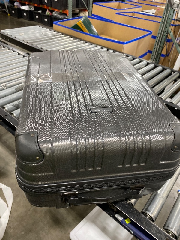 Photo 1 of **USED** Kenneth Cole REACTION Out of Bounds Lightweight Hardshell 4-Wheel Spinner Luggage, Charcoal, 28-Inch Checked