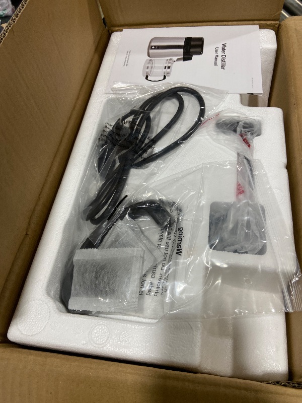 Photo 1 of CO-Z 1.1 Gallon Water Distiller, 4L Countertop Distilled Water Machine with Glass Pot, 750W Distilled Water Maker for Pure Water, 304 Stainless Steel Water Distiller Machine for Home Office Travel