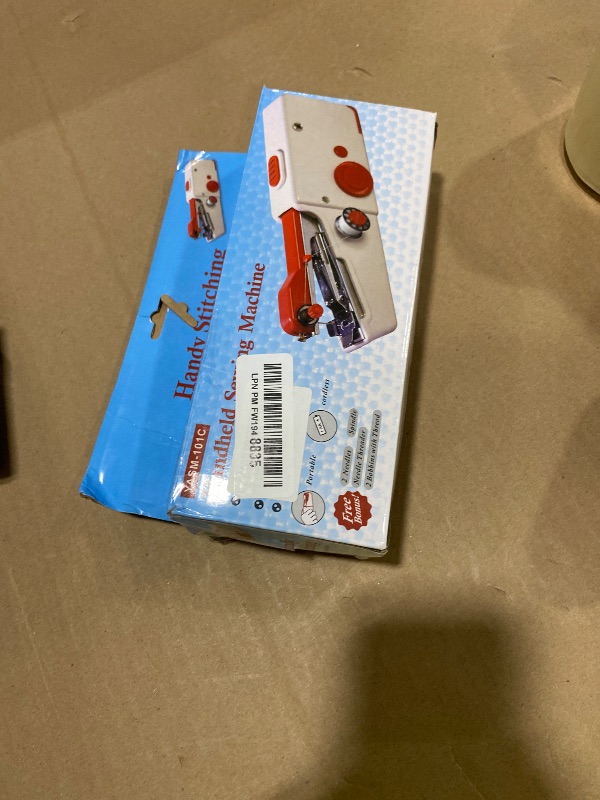 Photo 1 of Handheld Sewing Machine, Portable and Easy-to-Use Mini Sewing Machine, Battery and USB Operated, Ideal for Beginners and Home Use - Black