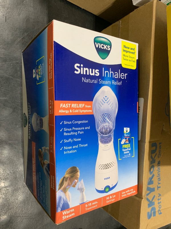 Photo 1 of Vicks Sinus Inhaler, New & Improved Non-Medicated Steam Inhaler for Sinus Relief, Allergies, Congestion & Colds, Vocal Steamer, Soothes Nasal & Throat Passages, Works with VapoPads (1 Included)