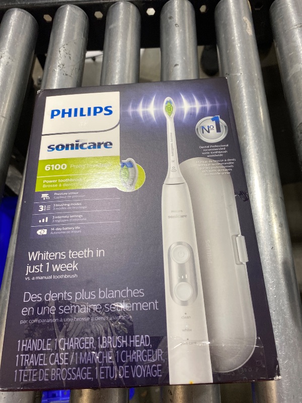 Photo 1 of Philips Sonicare ProtectiveClean 6100 Rechargeable Electric Toothbrush, with Pressure Sensor, 3 Cleaning Modes, SmarTimer and QuadPacer, 14-Day Battery Life, Travel Case, White, Model HX6877/21