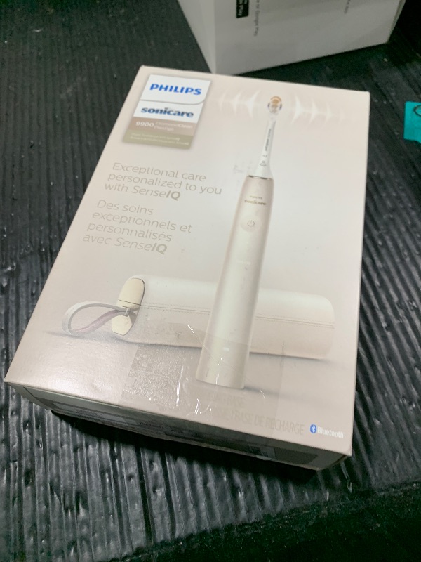 Photo 1 of Philips Sonicare DiamondClean 9900 Prestige Electric Toothbrush - with SenseIQ Technology and Advanced AI App, 5 Brushing Modes, 3 Intensity Levels, Charging Travel Case, Champagne, HX9990/11