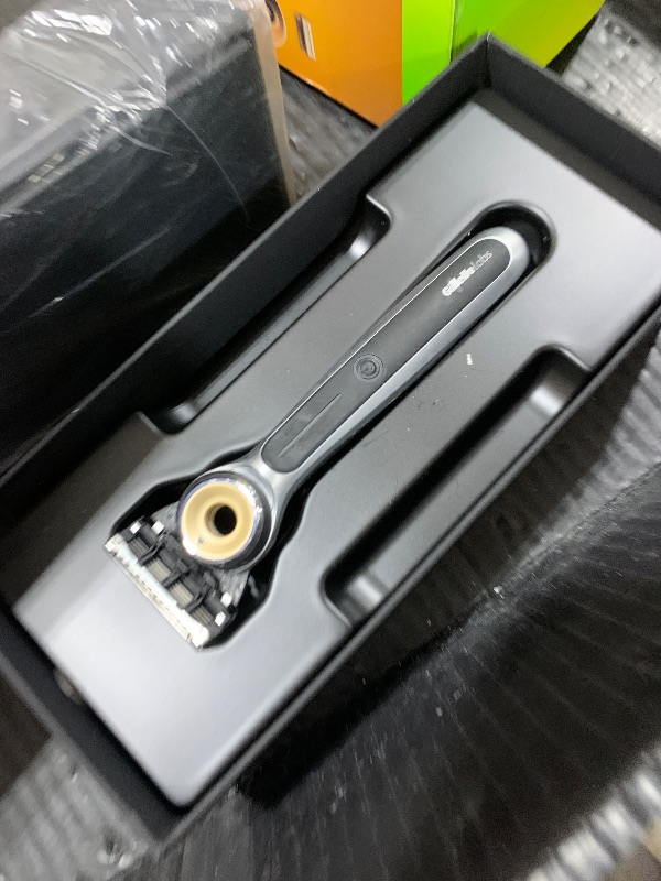 Photo 1 of Gillette Heated Razor for Men, Deluxe Travel Shave Kit by GilletteLabs, 1 Handle, 2 Blade Refills, Charging Dock, Case