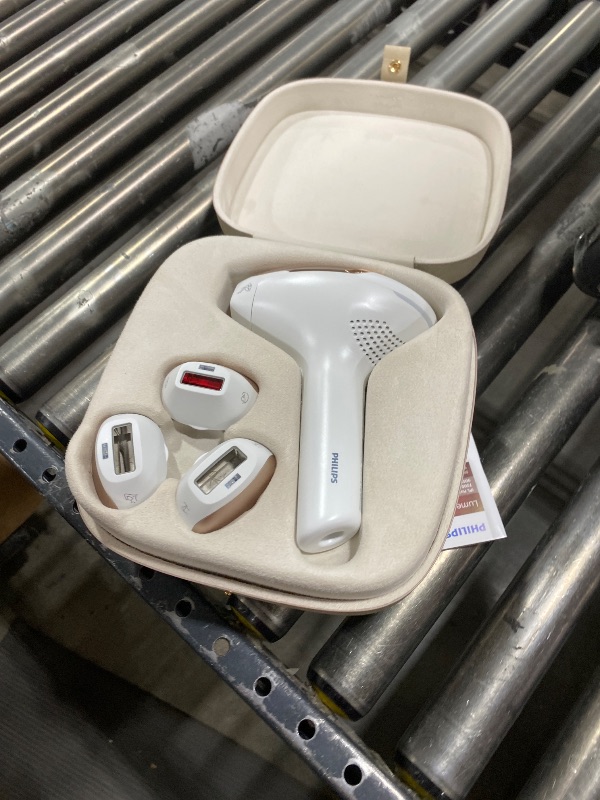 Photo 1 of Philips Lumea 9000 Series IPL Hair Removal Device, Visible Permanent Laser Hair Reduction Done at Home, for Women & Men, SenseIQ Technology, 4 Attachments for Body, Face, Bikini & Underarms, BRI984/03
