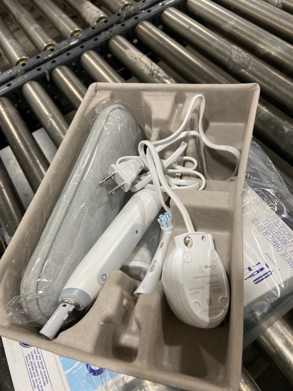 Photo 1 of Oral-B iO Deep Clean Rechargeable Electric Toothbrush, White, iO Series 3 Limited, 2 Brush Heads, Travel Case, Pressure Sensor, 3 Cleaning Settings, 2-Minute Timer