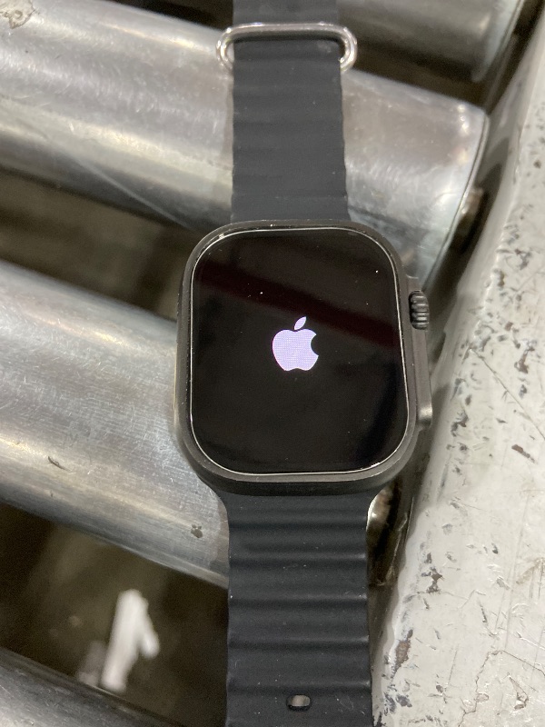 Photo 1 of Apple Watch Ultra 2 (GPS + Cellular, 49MM) - Black Titanium Case with Black Ocean Band (Renewed Premium)