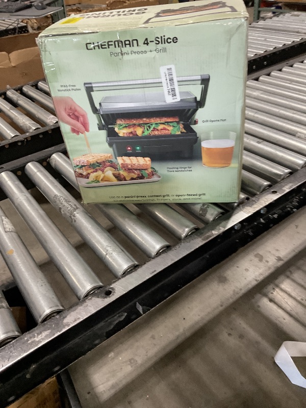 Photo 1 of *********READ CLERK NOTES*********
Chefman Panini Press Grill and Gourmet Sandwich Maker Non-Stick Coated Plates, Opens 180 Degrees to Fit Any Type or Size of Food, Stainless Steel Surface and Removable Drip Tray, 4 Slice, Black