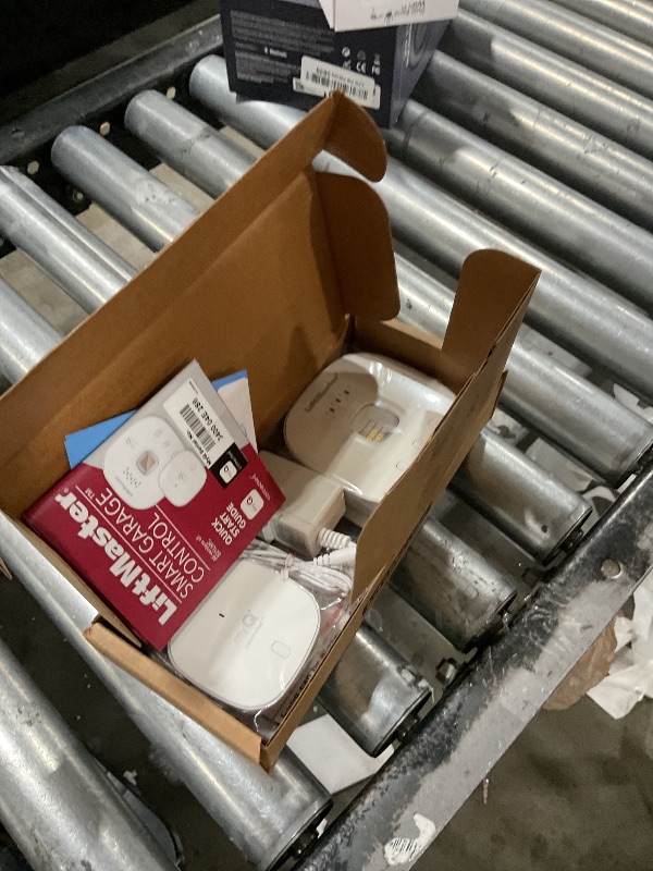 Photo 1 of Liftmaster myQ Smart Garage Control - Wireless Garage Hub and Sensor with WiFi & Bluetooth - Smartphone Controlled, 821LMC-S, White