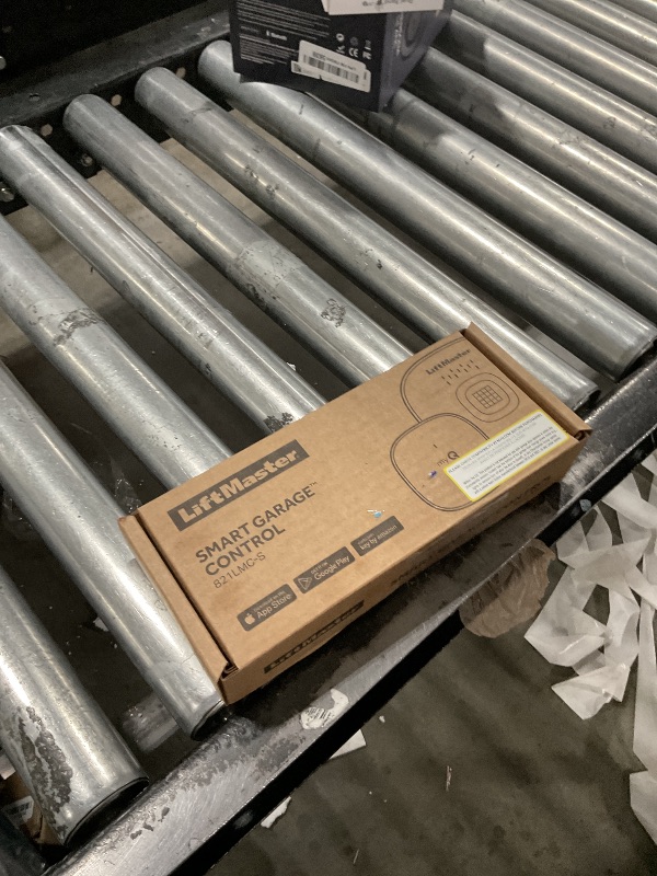 Photo 1 of Liftmaster myQ Smart Garage Control - Wireless Garage Hub and Sensor with WiFi & Bluetooth - Smartphone Controlled, 821LMC-S, White