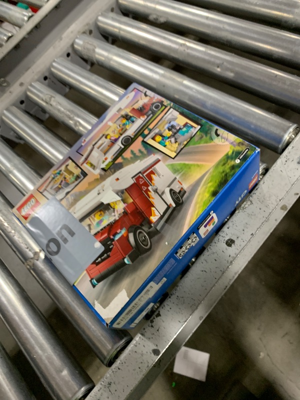 Photo 1 of **********MISSING PARTS*******
LEGO City Holiday Adventure Camper Van Building Toy Set - Vacation Toy for Kids, Boys and Girls, Ages 6+ - Includes 3 Minifigures and Accessories - Gift Idea for Birthdays & Holidays - 60454