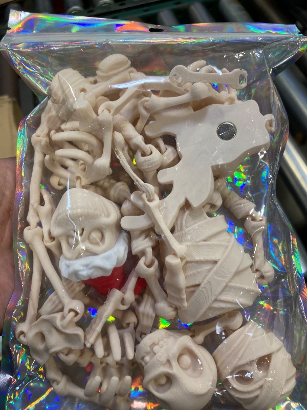 Photo 1 of 4 Pack Skeletons Halloween Decorations 6” Mini Skeleton Figure with Magnet Back for Halloween Decor, Haunted House, Spooky Office Desk Decor, Refrigerator Magnets & Scary Party Favors