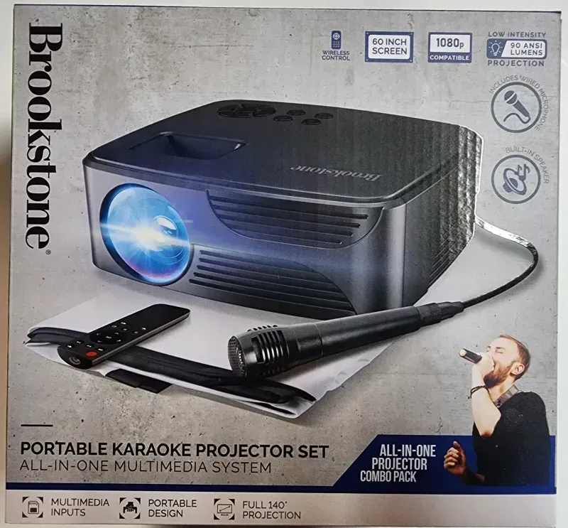 Photo 1 of Brookstone All-In-One Home Karaoke Projector Set with Microphone. You've always wanted to be the life of the party, and now you can this all-in-one home karaoke projector with microphone that lets you sing along with your favorite songs. It's got a built-