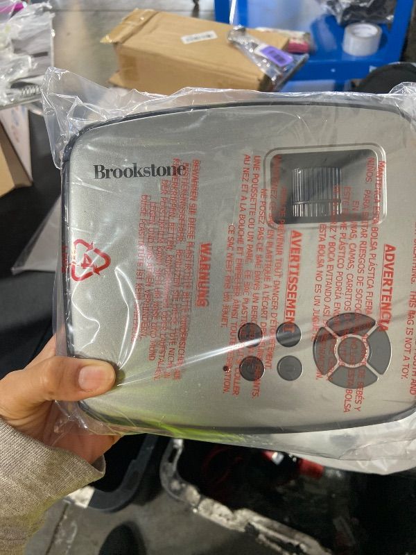 Photo 1 of Brookstone All-In-One Home Karaoke Projector Set with Microphone. You've always wanted to be the life of the party, and now you can this all-in-one home karaoke projector with microphone that lets you sing along with your favorite songs. It's got a built-
