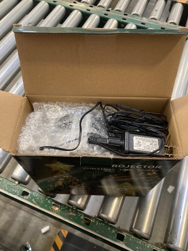 Photo 1 of Christmas Tree Topper Lighted with Built-in LED Rotating Snowflake Projector, 3D Hollow Glitter Silver Snowflake Tree Topper for Xmas Party Holiday Christmas Decorations