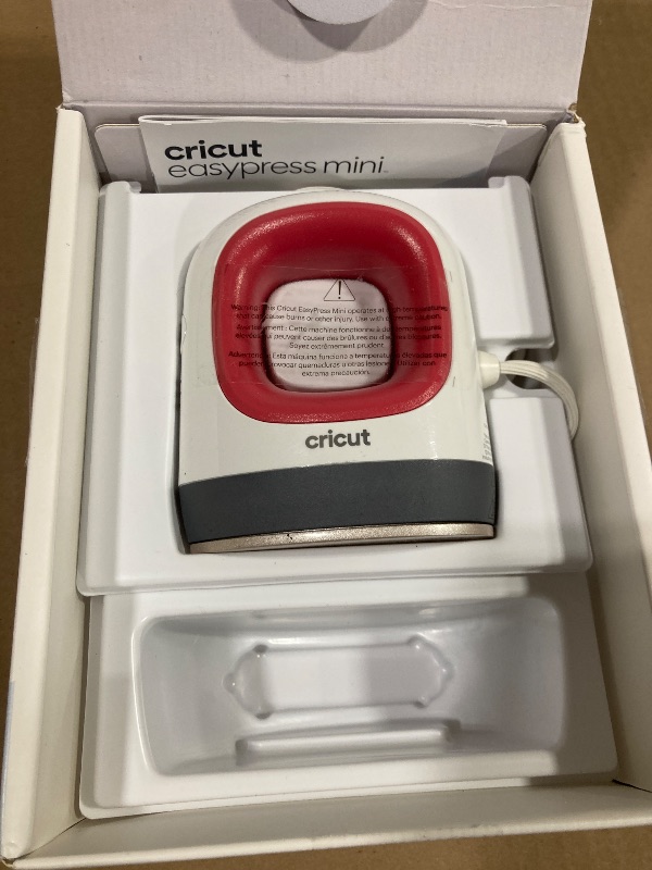 Photo 1 of Cricut EasyPress Mini for Heat-Pressing Small Objects like Shoes, Stuffed Animals, Hats and More, Features 3 Heat Settings & Precision Tip, Ceramic-Coated Heat Plate, Compact & Lightweight, Red
