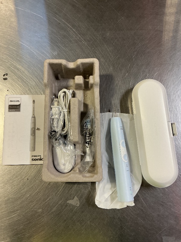 Photo 1 of Philips Sonicare ProtectiveClean 5100 Rechargeable Electric Toothbrush, with Pressure Sensor, 3 Cleaning Modes, SmarTimer and QuadPacer, 14-Day Battery Life, Travel Case, White, Model HX6857/11