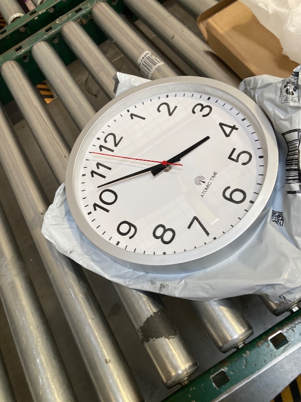 Photo 1 of AKCISOT Atomic 12 Inch Wall Clock Analog Clocks for Indoor Kitchen, Battery Operated Clock for Bedroom Office Classroom Living Room(Silver)