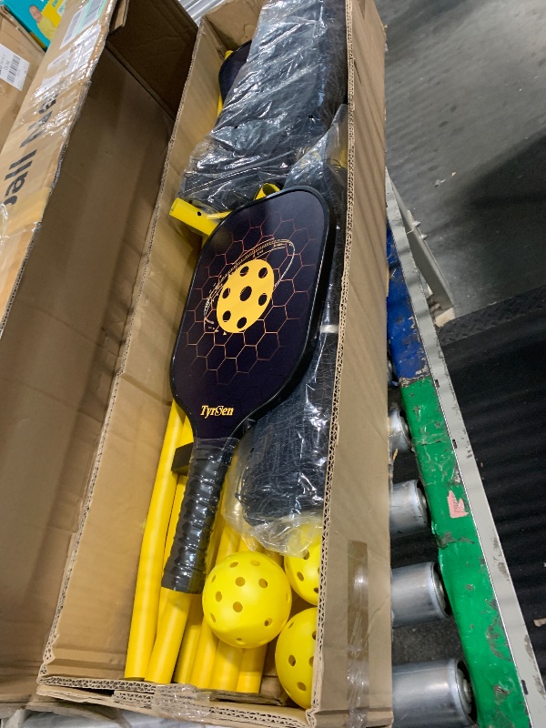 Photo 1 of ***DAMAGED AND MISSING PARTS*** TYRSEN Pickleball Set with Net, 22 FT & Half Court 11 FT Pickleball Net, 4 Fiberglass Rackets, Portable Pickleball Set, Pickle Ball Net System with Carrying Bag for Court, Driveway, Backyards