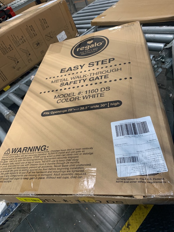 Photo 1 of *MISSING PARTS - See Clerk Notes*
Regalo Safety 29-38.5" Baby Gate for Doorways & Bottom of Stairs, Pressure Mounted Baby Gate with Door for Babies, Toddlers & Pets, Tested & Safe for 30 Years, American Designed, American Owned, White