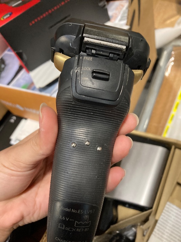 Photo 1 of ***It looks used.*** Panasonic Electric Razor for Men, Electric Shaver for Men, ARC5 with Premium Automatic Cleaning and Charging Station, Wet Dry Shaver, Cordless Razor, with Pop-Up Trimmer ES-LV97-K, Black