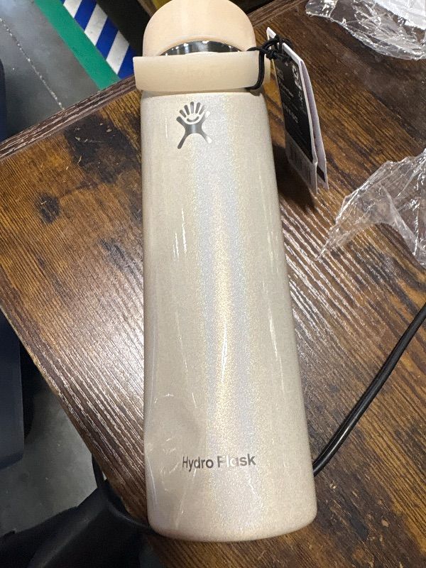 Photo 1 of **DENTED LOOK AT LIVE PHOTO**
Hydro Flask Water Bottle - Insulated Stainless Steel - Wide Straw Lid, Non-Spill, Leakproof in 24 Oz Glimmer Cream