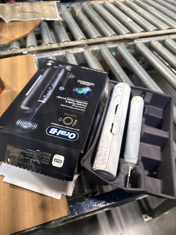 Photo 1 of ***VERY USED// MISSING PARTS*** Oral-B iO Series 9 Limited Rechargeable Black Electric Toothbrush with (2) Ultimate Clean and (1) Gentle Care Replacement Brush Heads, Black, Travel Case and Charger