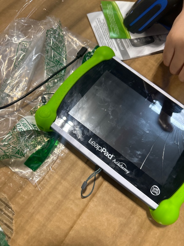 Photo 1 of ****BROKEN GLASS ***MISSING CHARGER ****
LeapFrog LeapPad Academy Kids’ Learning Tablet, Green