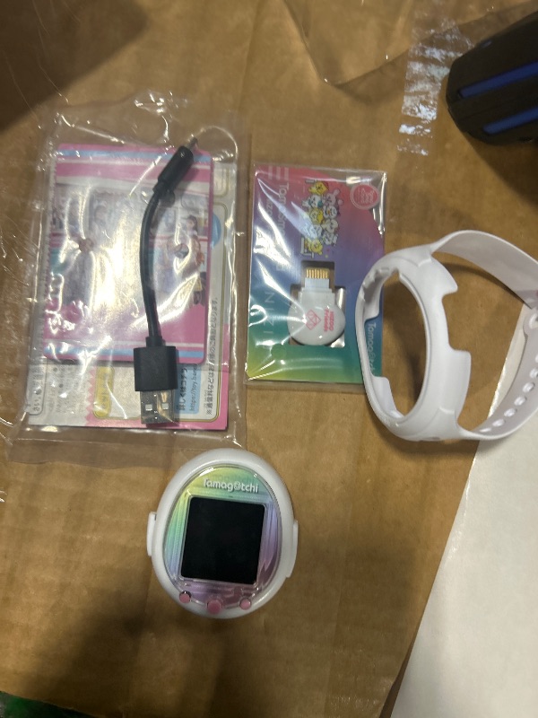 Photo 1 of ***CHARGER DONT WORK***
Tamagotchi Smart NiziU Special Set