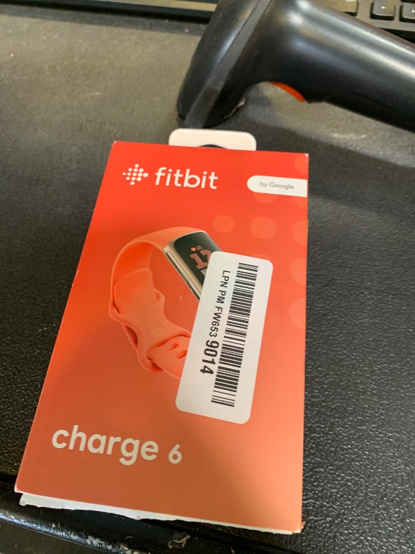 Photo 1 of Fitbit Charge 6 Fitness Tracker with Google apps, Heart Rate on Exercise Equipment, 6-Months Premium Membership Included, GPS, Health Tools and More, Gold/Coral, One Size (S & L Bands Included)