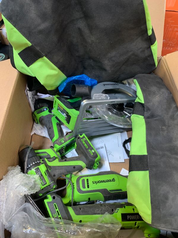 Photo 1 of GREENWORKS 24V (8-TOOL) Combo (Drill, Impact Driver, Circular Saw, Reciprocating Saw, Jigsaw, Multi-Tool, Sander, Flashlight), 4.0Ah + (2) 2.0Ah (Power Bank) Batteries, (2) Cables, 65W Rapid Charger