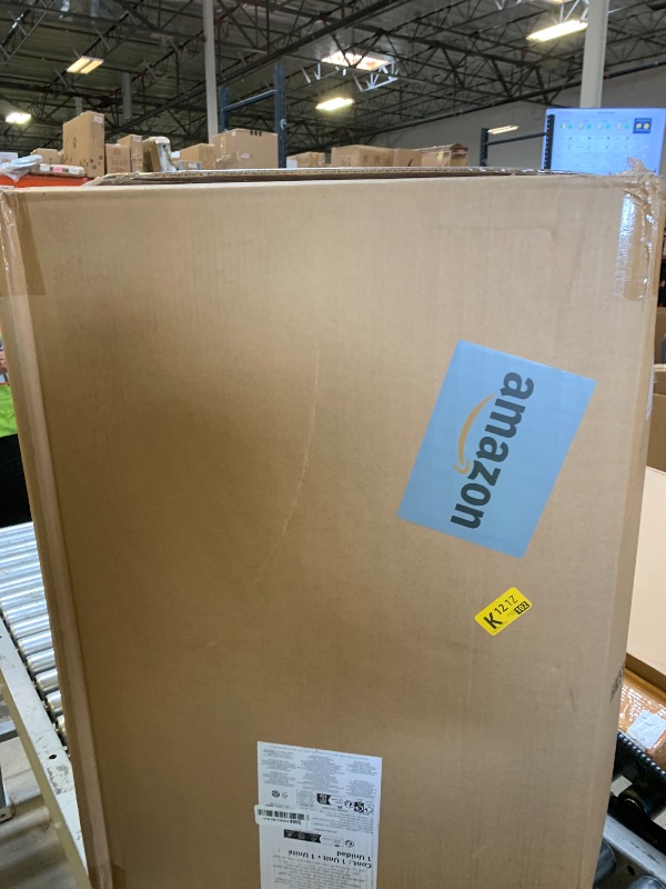 Photo 1 of Amazon Basics 30" Hardside Large Checked Luggage, Hardshell Suitcase With Four Multi-directional Wheels, Expandable For Up to 15% More Space, Scratch-Resistant Shell, Black