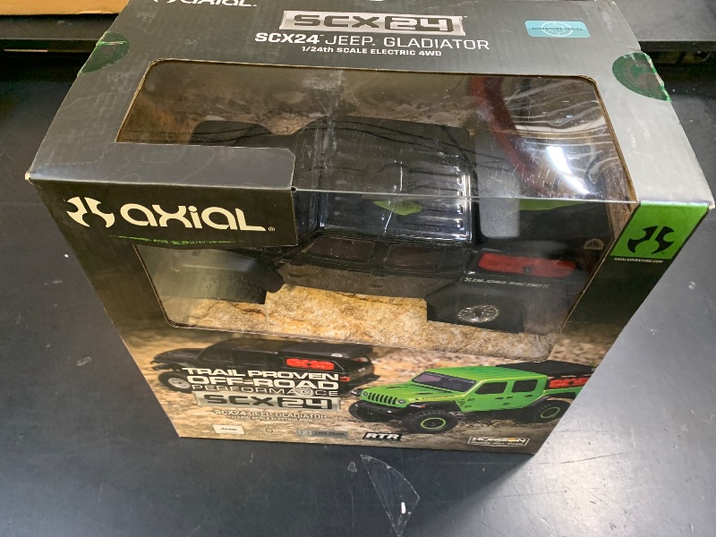 Photo 1 of Axial RC Truck SCX24 Jeep Gladiator 4 Wheel Drive Rock Crawler Brushed RTR (Nothing Needed to Complete Ready-to-Run), Black, AXI00005V2T5, Remote Control Car, RC Car, RC Crawler