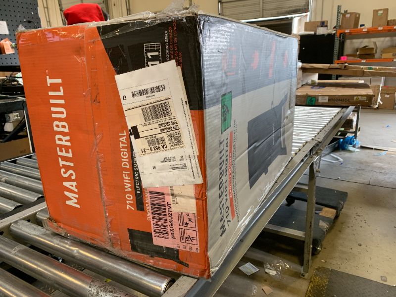 Photo 1 of Masterbuilt®710 WiFi Digital Smoker, Vertical Design, 711 Cooking Sq. Inches, 4 Chrome Coated Smoking Racks, Wood Chip Loader, Electric Fuel Source to Plug in and Start Cooking, Black Model MB20070924