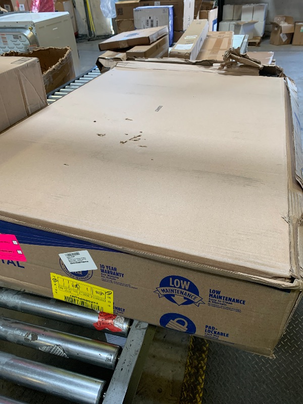 Photo 1 of Suncast 34 Cu Ft Horizontal Resin Storage Shed - Outdoor Storage Shed with Floor Included, Lockable, Weatherproof, Fits Small to Medium Trash Cans, Generators, & Garden Tools, Stoney Black