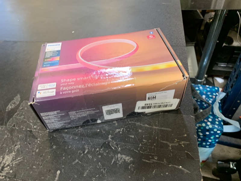 Photo 1 of Philips Hue Indoor 6-Foot Smart LED Light Strip Base Kit with Plug - Flowing Multicolor Effect - 1 Pack - Control with Hue App - Compatible with Alexa, Google Assistant and Apple HomeKit